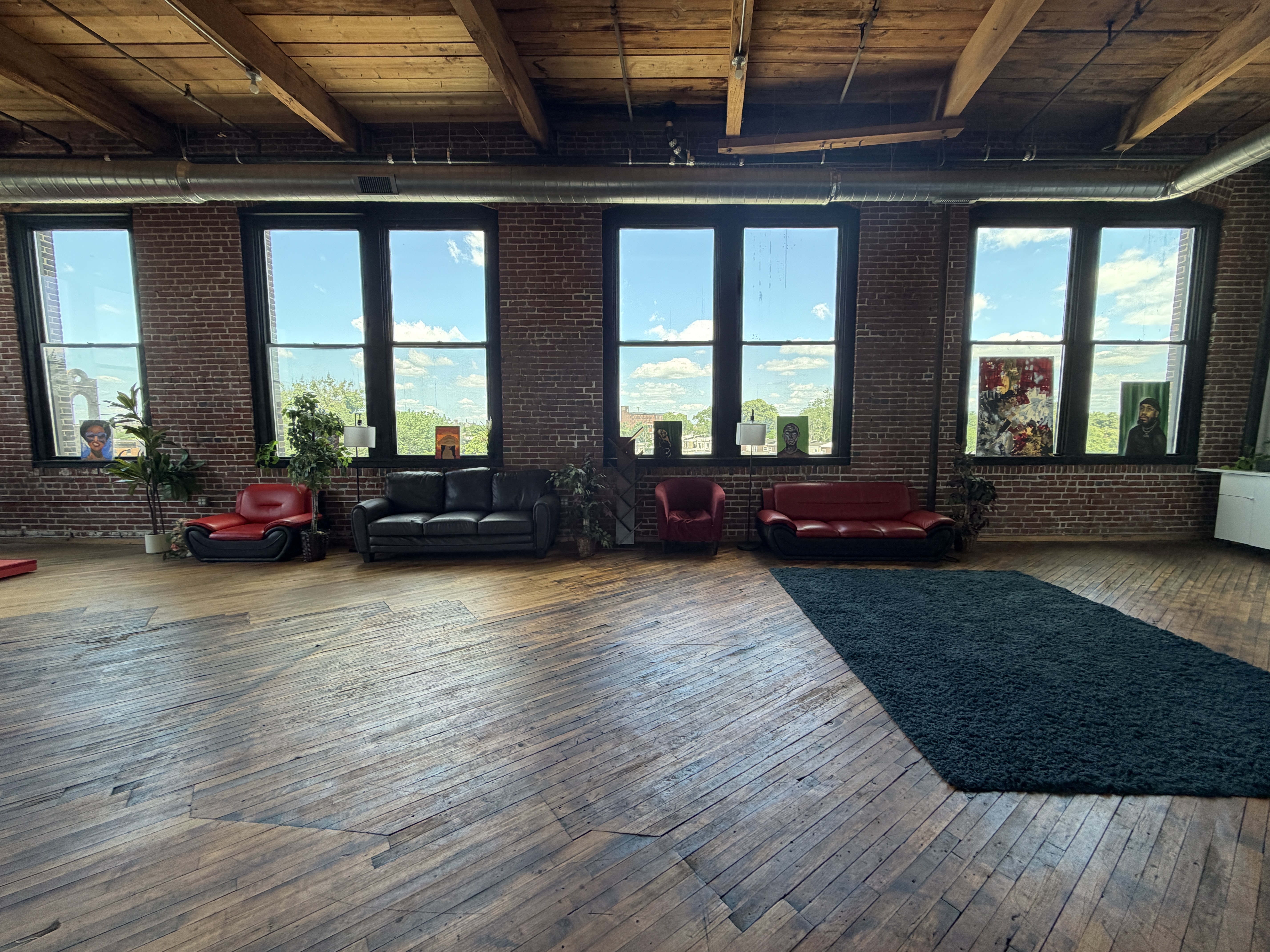 Exposed brick backdrop at The Loft 215 creative space